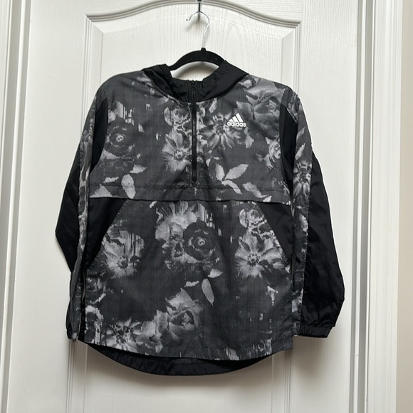 Adidas light rain coat with a zip up front and hood - Picture 2 of 4